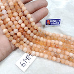 Sheded Peach 6mm Agate beads 1 string